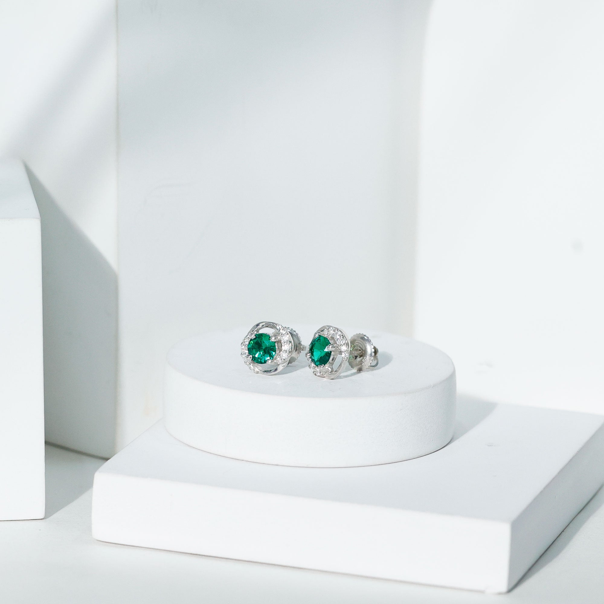 Certified 1 Carat Lab Grown Emerald Swirl Stud Earrings with Moissanite