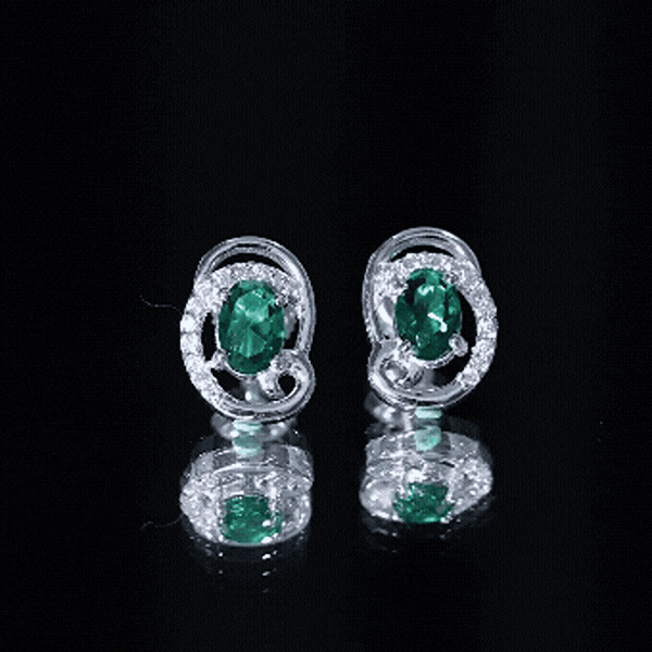 Oval Shaped 1.7 Carat Lab Grown Emerald Designer Earrings in Sterling Silver