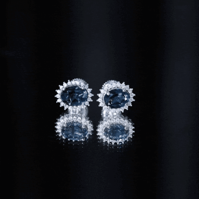 Oval Shaped 2.2 Carat London Blue Topaz Stud Earrings with Moissanite Halo