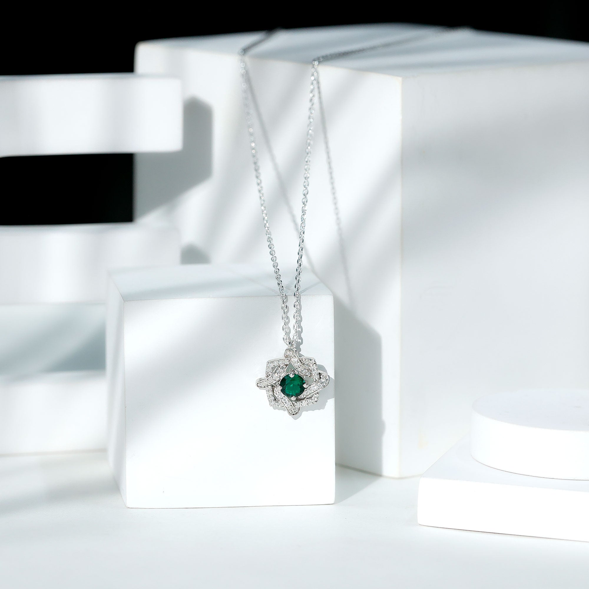 Certified 0.8 Carat Lab Grown Emerald Interlock Necklace with Silver Chain