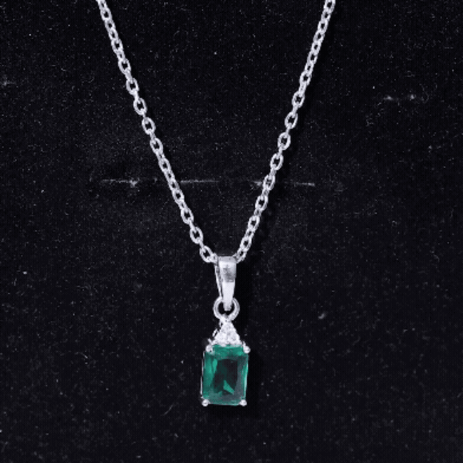 1.68 Carat Emerald Cut Lab Grown Emerald Solitaire Necklace With Silver Chain