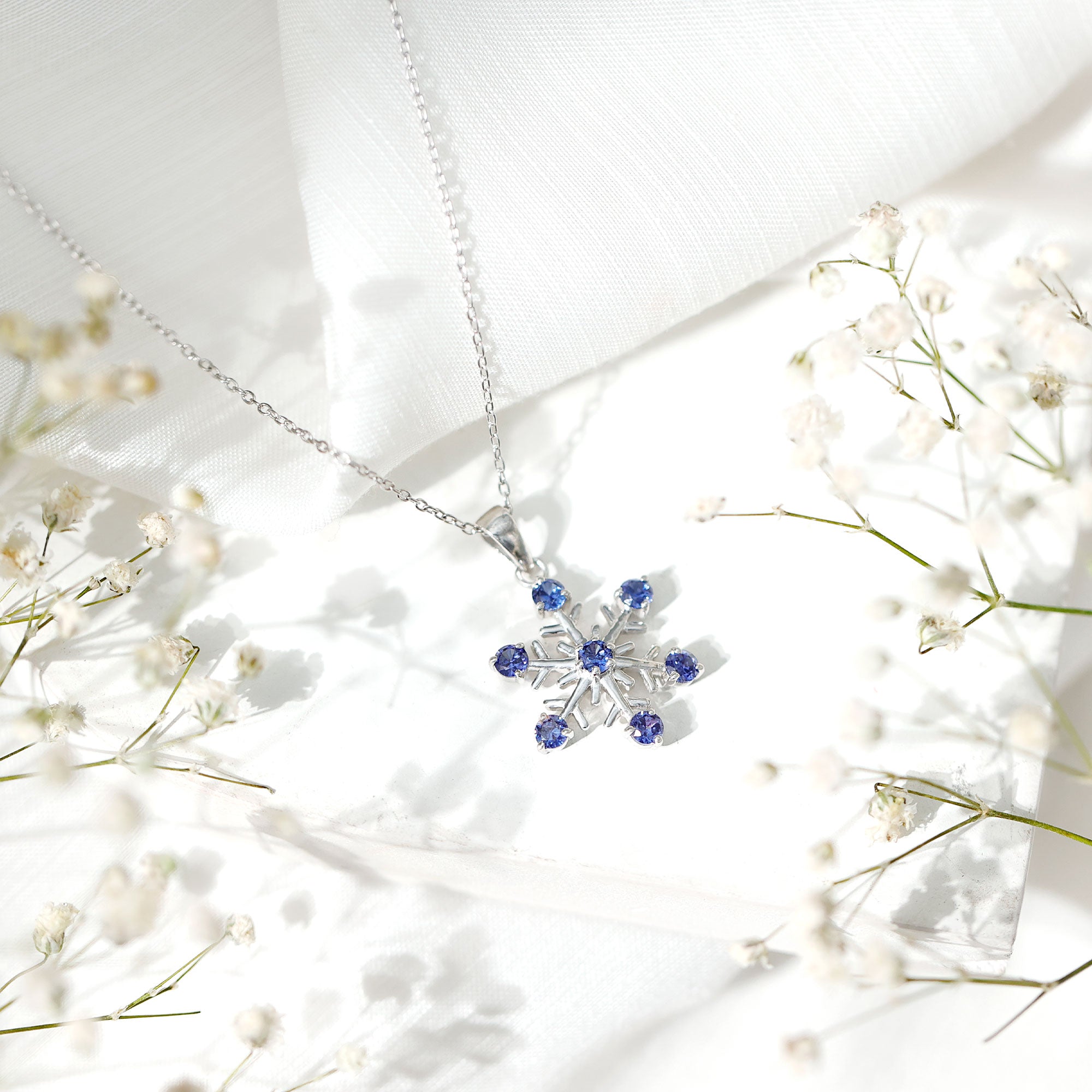 Lab Created Blue Sapphire Snowflake Pendant Necklace With Chain