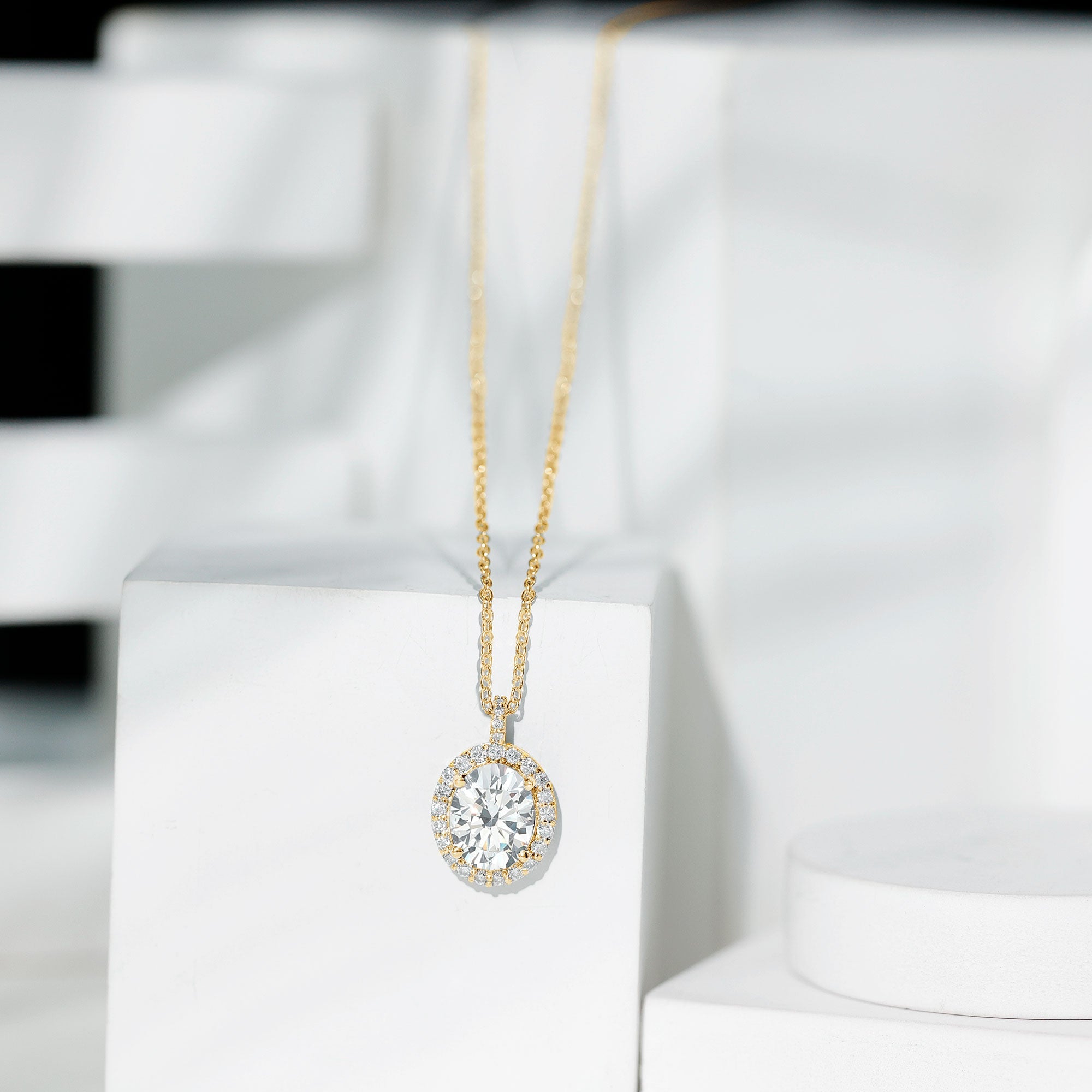 Oval Simulated Diamond Cocktail Halo Pendant