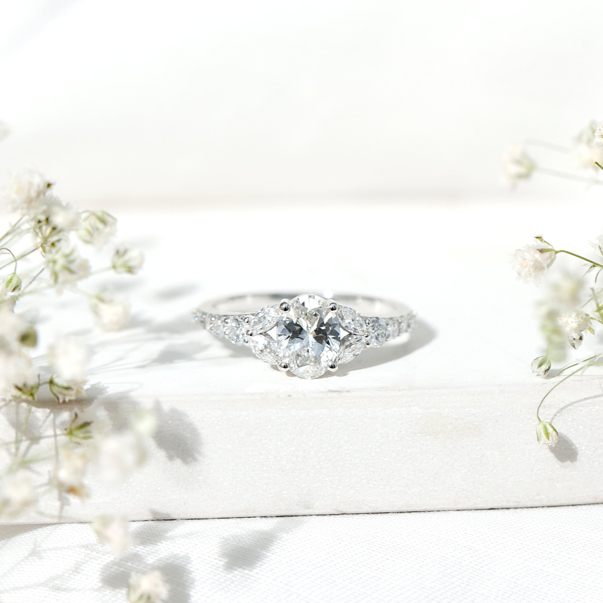 Certified 6X8MM Oval Lab Grown Diamond Engagement Ring With Side Stones