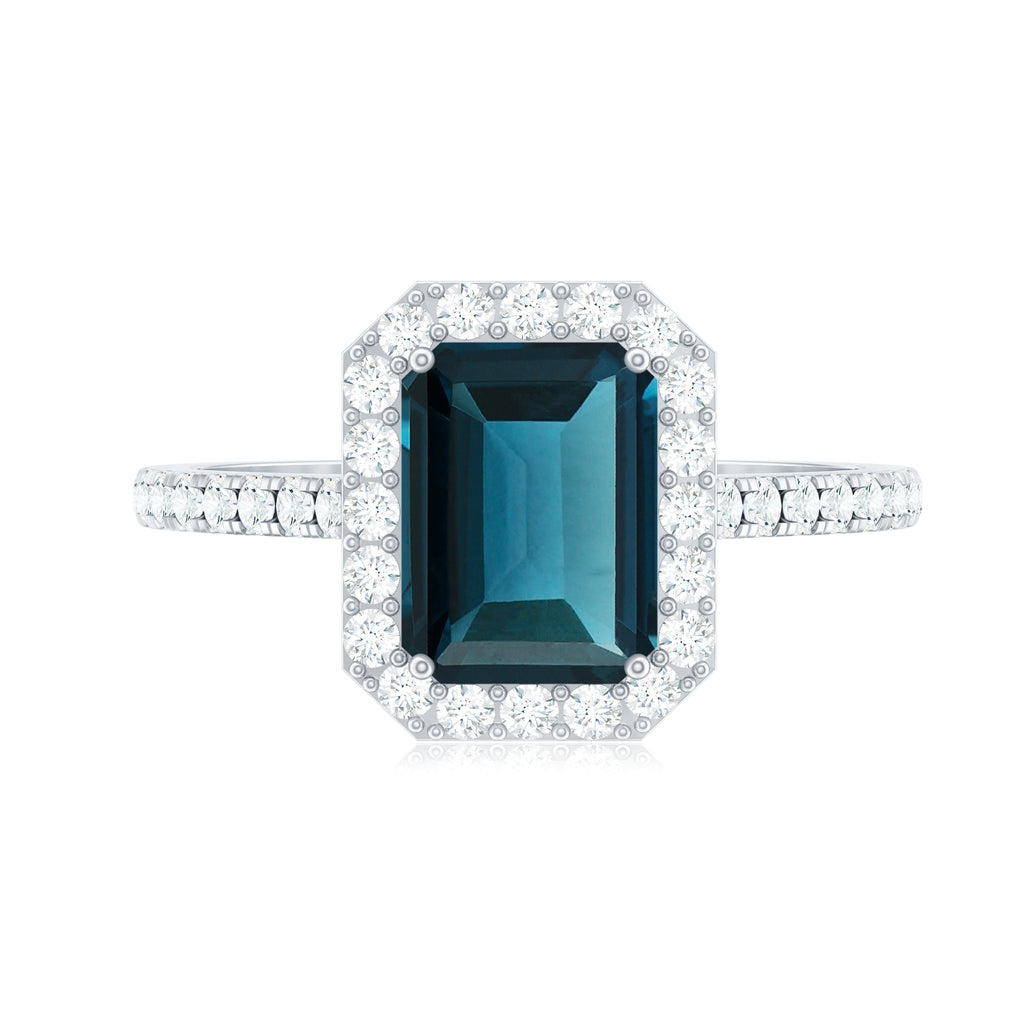 6X8mm Emerald Cut London Blue Topaz Engagement Ring with Diamond Halo