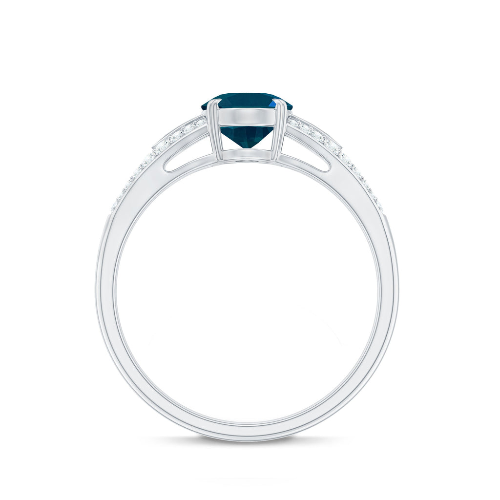 6x8mm Oval Cut London Blue Topaz Solitaire Engagement Ring with Diamond Split Shank