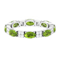 Oval Cut Peridot and Diamond Eternity Ring