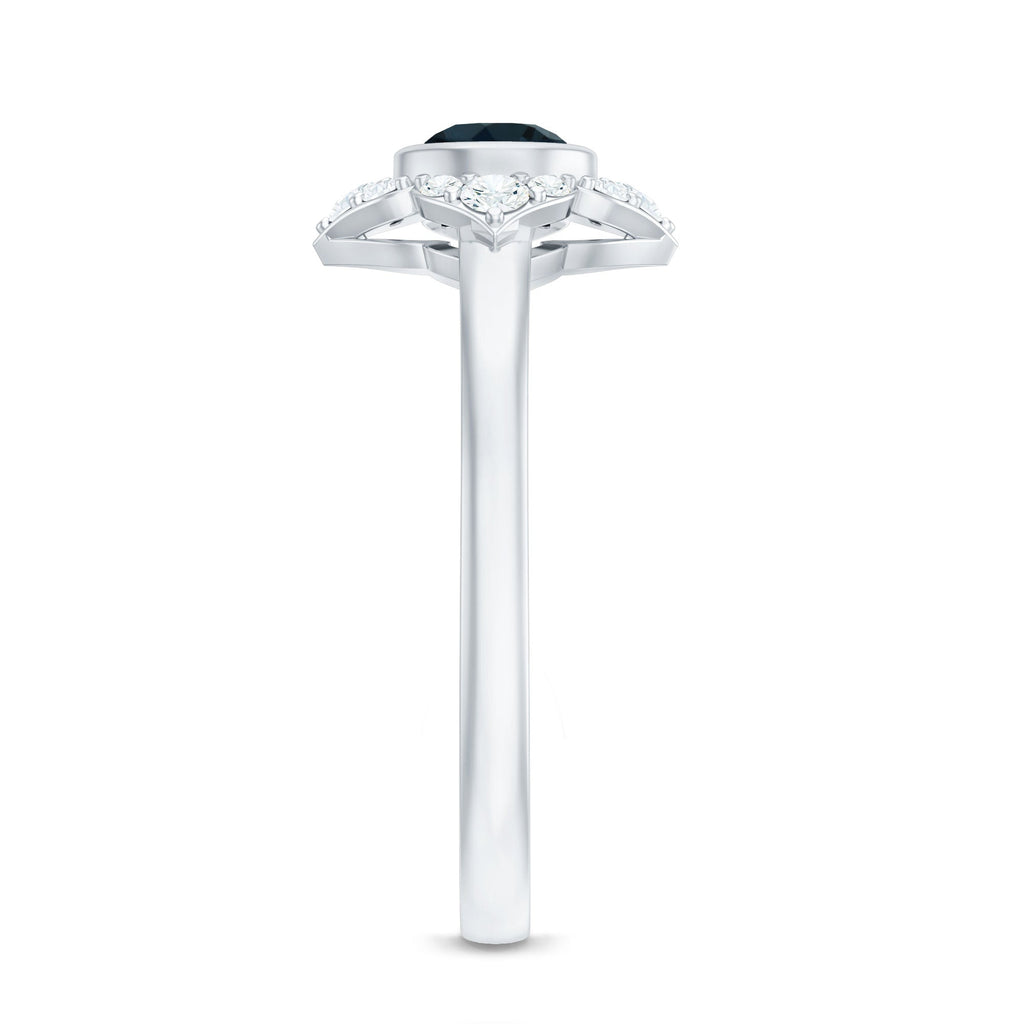 London Blue Topaz Bezel Engagement Ring with Diamond Halo
