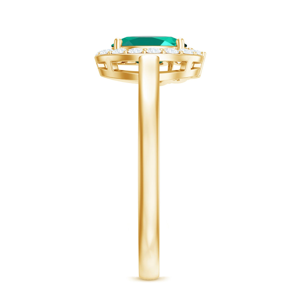 Classic 5X7 mm Oval Lab Grown Emerald Engagement Ring with Diamond Halo