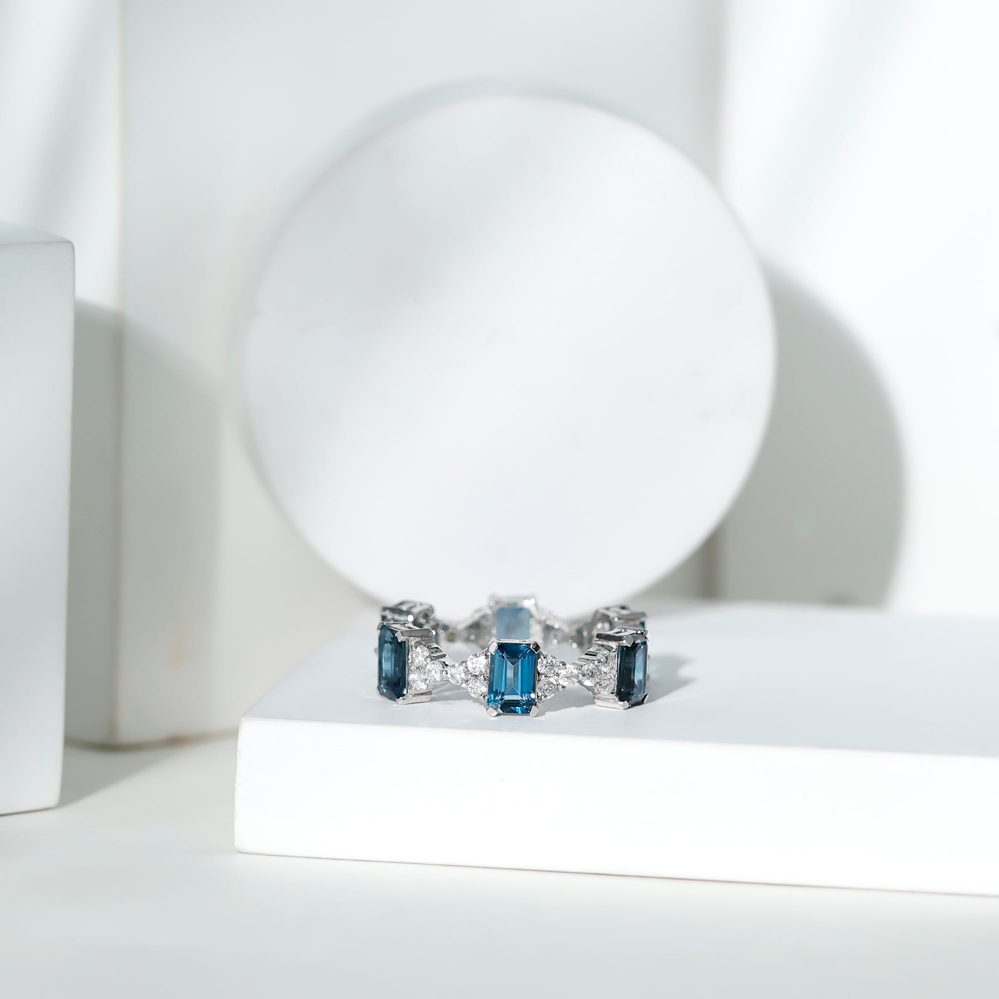 Emerald Cut London Blue Topaz Designer Eternity Ring with Moissanite