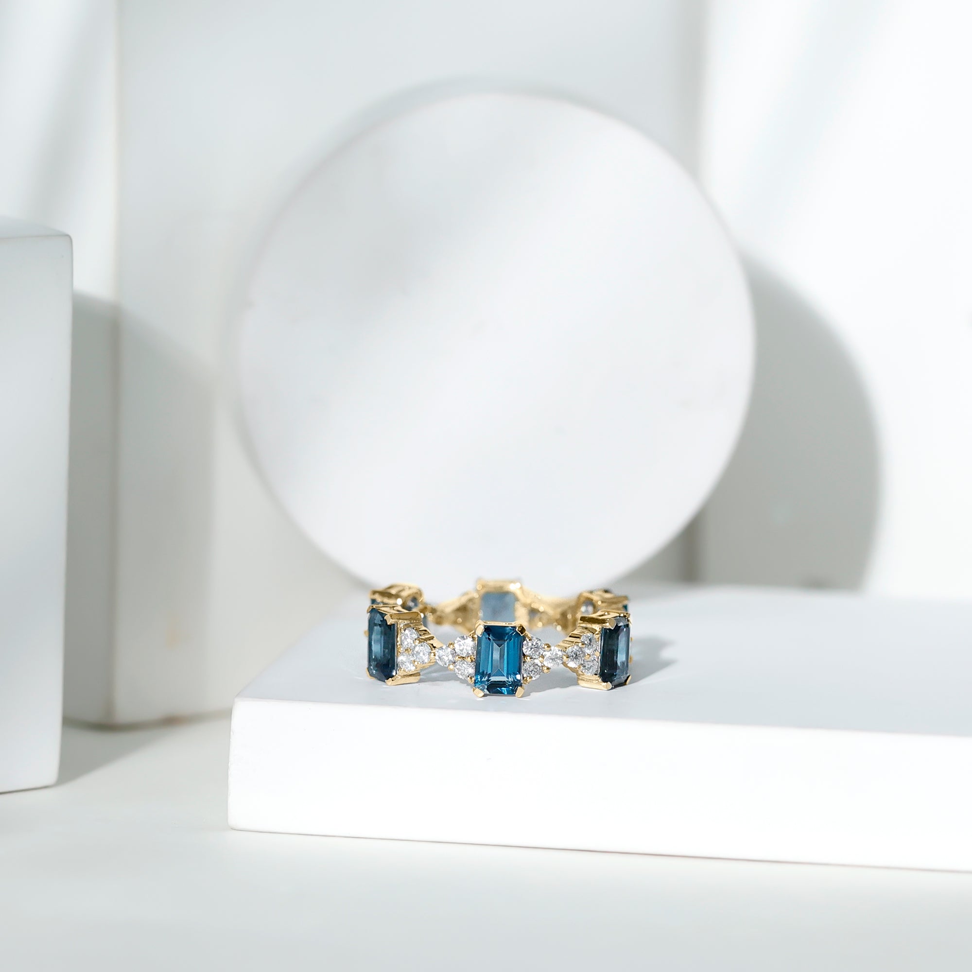 Emerald Cut London Blue Topaz Designer Eternity Ring with Moissanite