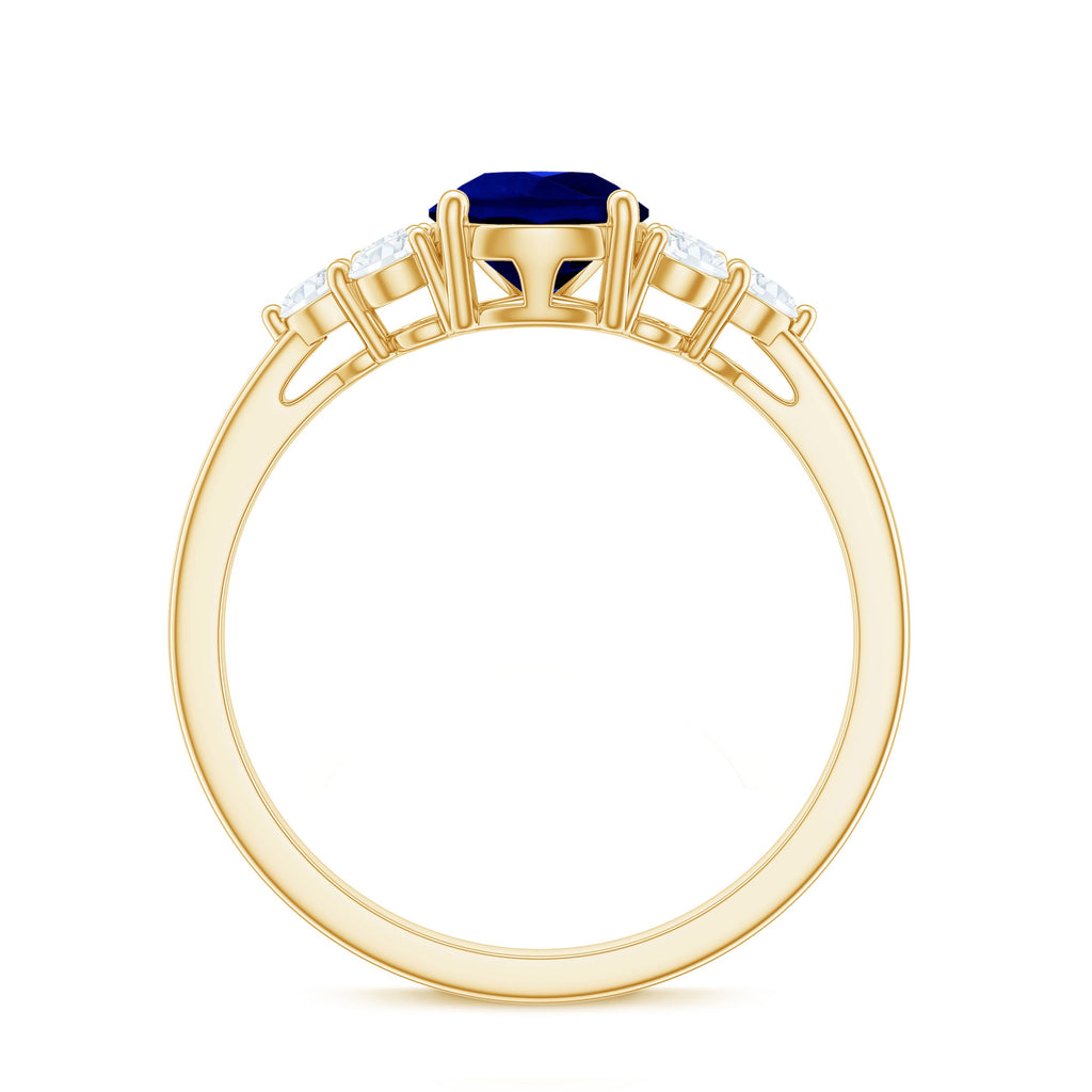 Certified 1.6 Carat Lab Grown Blue Sapphire Pear Engagement Ring with Diamond Trio