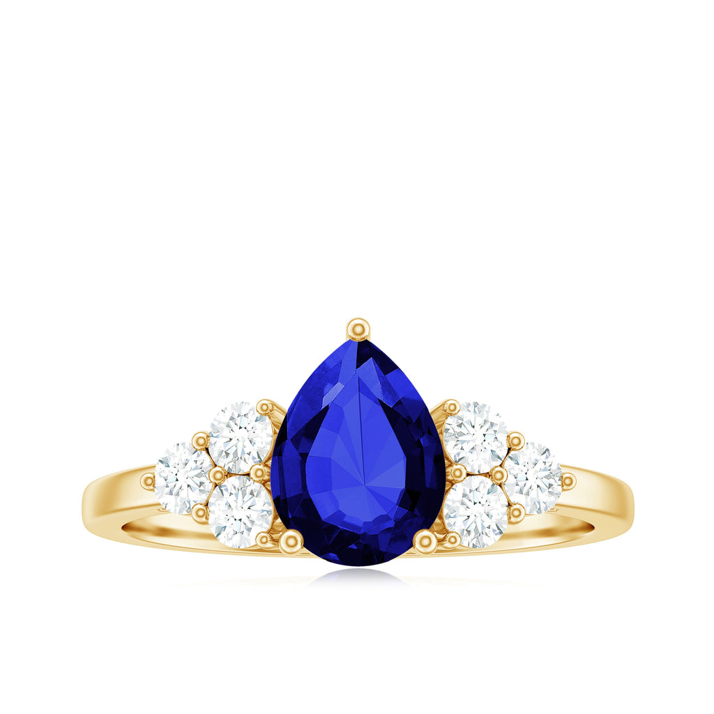 Certified 1.6 Carat Lab Grown Blue Sapphire Pear Engagement Ring with Diamond Trio