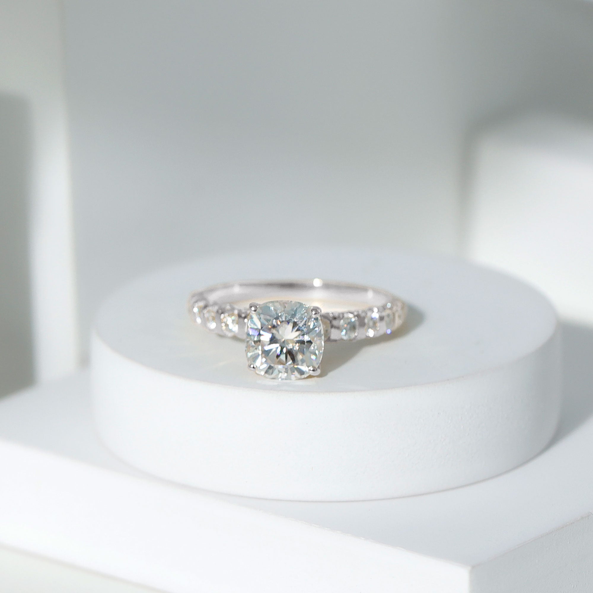 Cushion Cut Zircon Engagement Ring with Side Stones