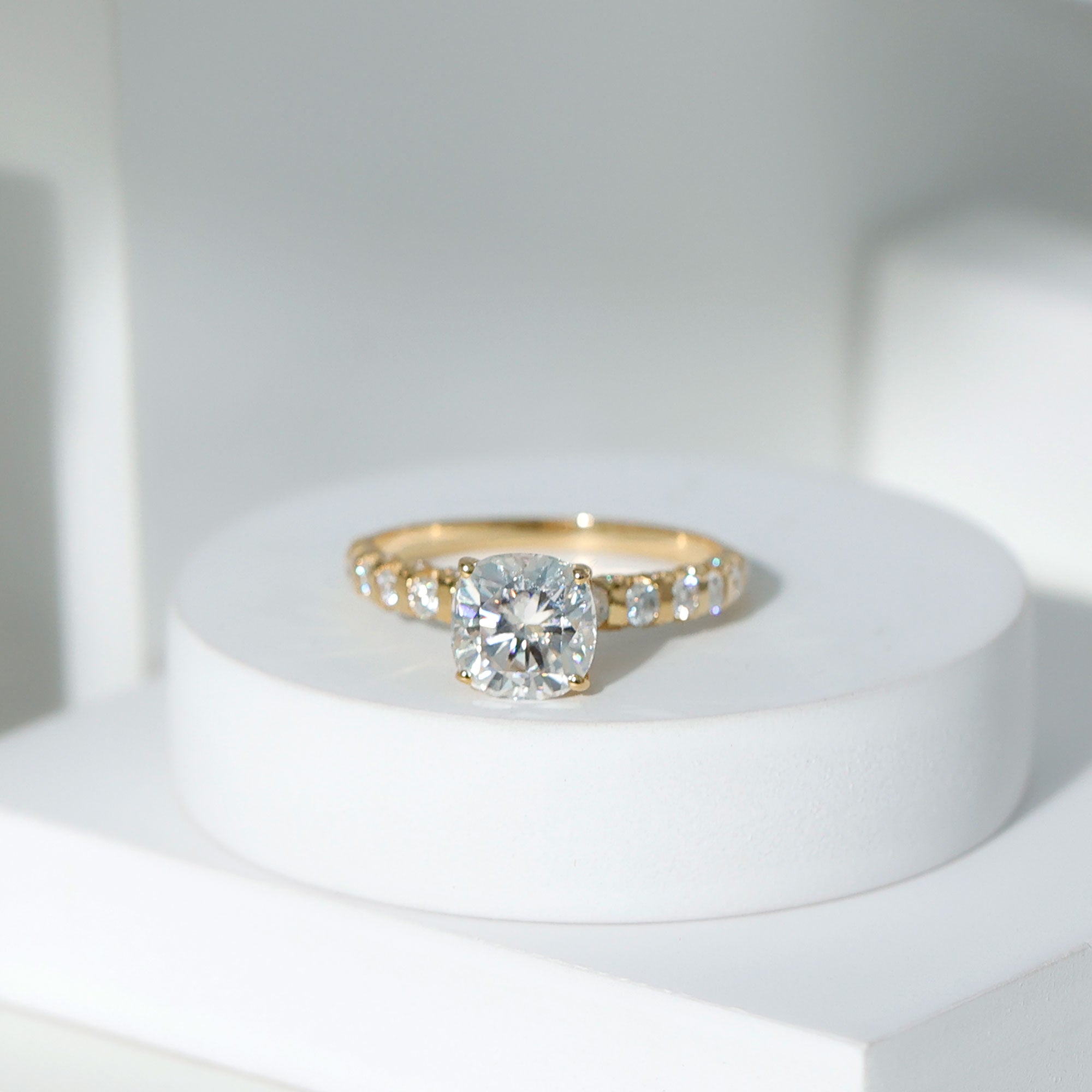 Cushion Cut Zircon Engagement Ring with Side Stones
