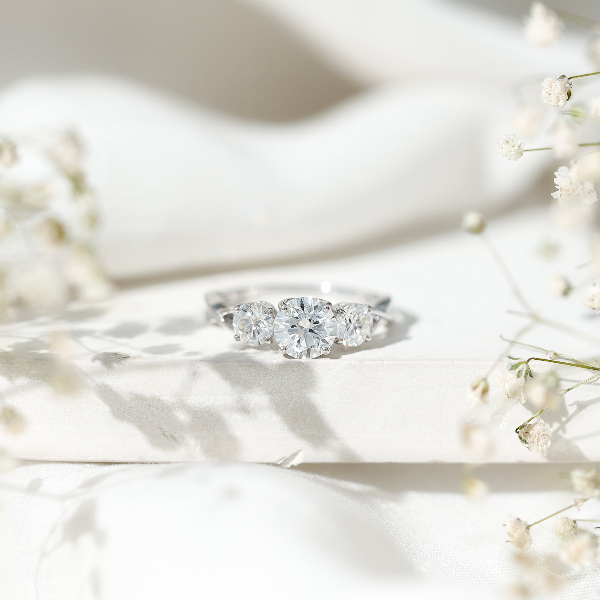 Lab Grown Diamond Three Stone Engagement Ring with Crossover Shank