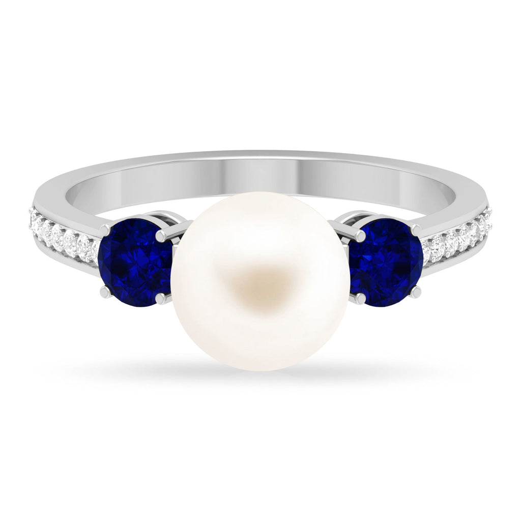 White Pearl and Sapphire 3 Stone Engagement Ring with Diamond