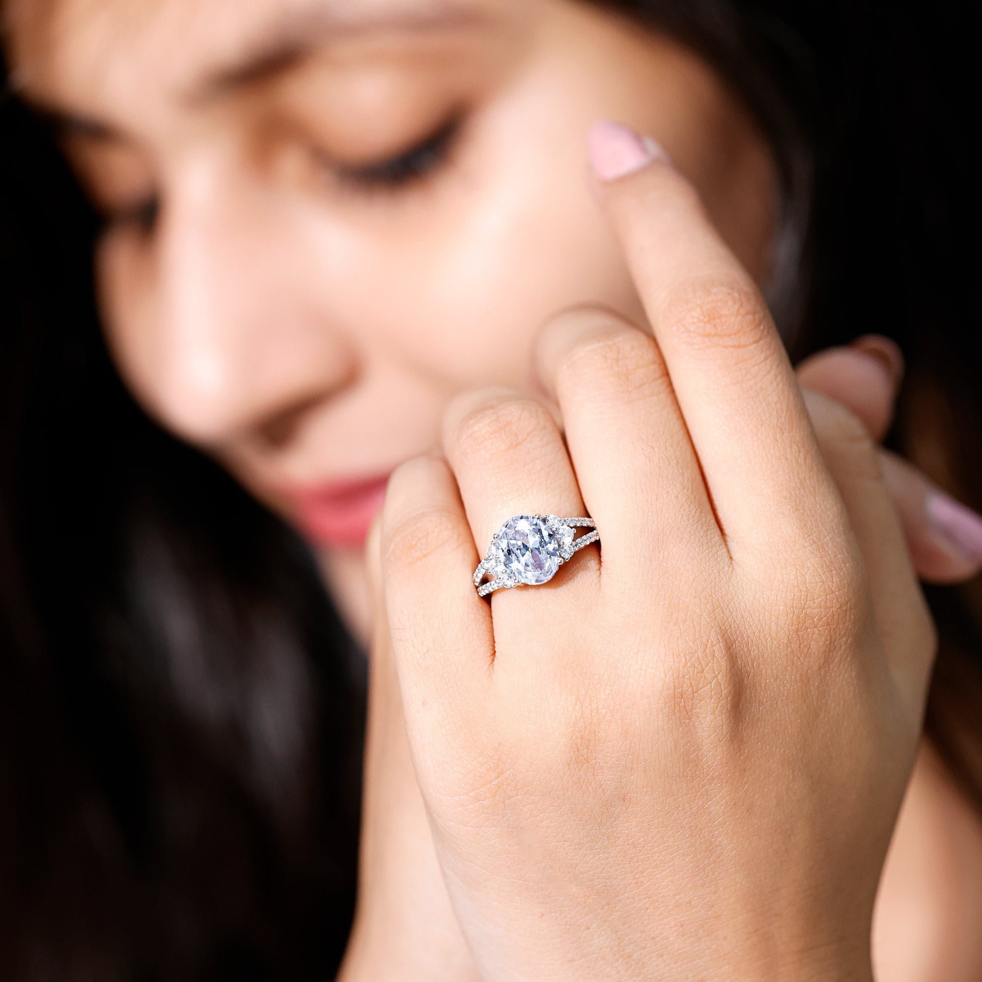 Solitaire Cubic Zirconia Oval Engagement Ring with Side Stones