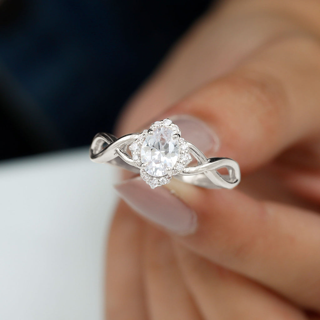 1.2 Carat Oval Cubic Zirconia Flower Engagement Ring in Crossover Shank