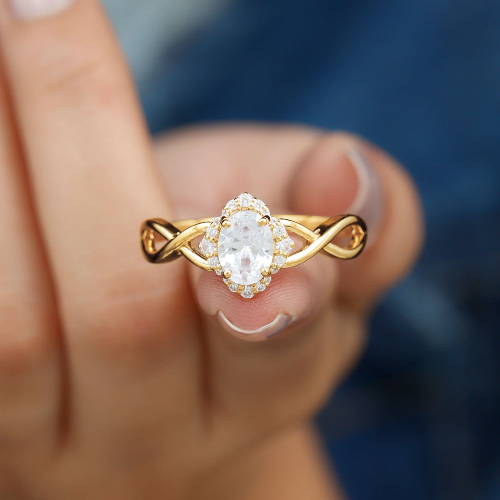 1.2 Carat Oval Cubic Zirconia Flower Engagement Ring in Crossover Shank