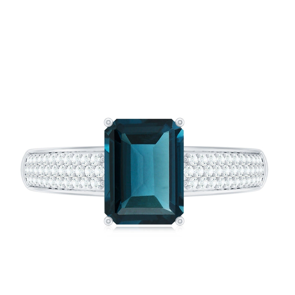 6X8mm Emerald Cut London Blue Topaz Side Stone Engagement Ring with Diamond