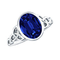 Certified 4 Carat Oval Lab Grown Blue Sapphire Bezel Set Engagement Ring