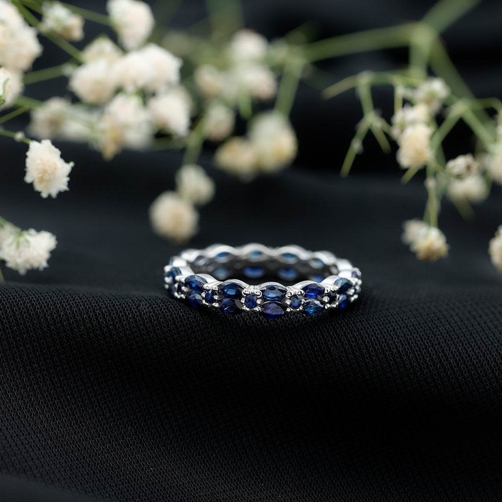 Contemporary Marquise and Round Blue Sapphire Full Eternity Ring