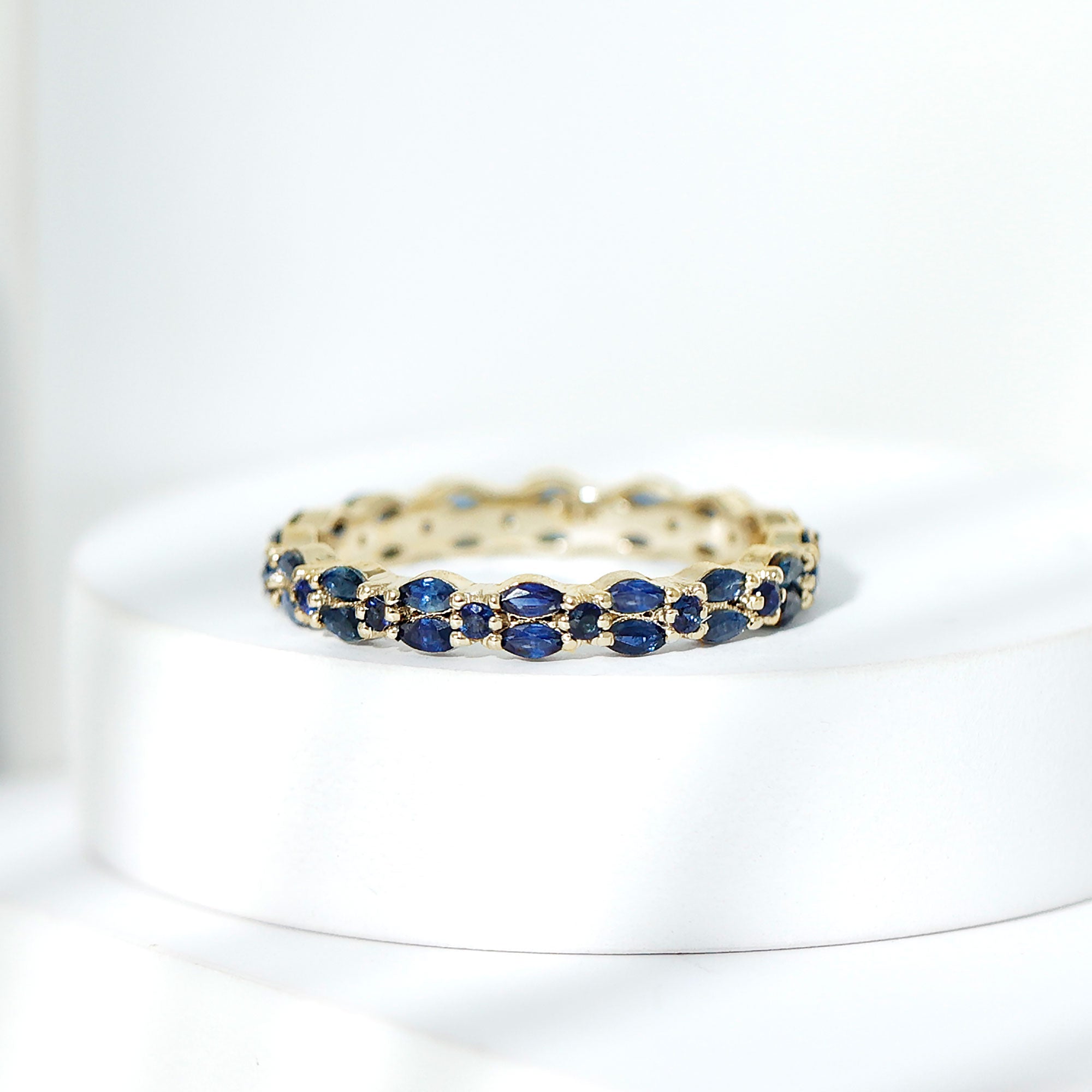 Contemporary Marquise and Round Blue Sapphire Full Eternity Ring