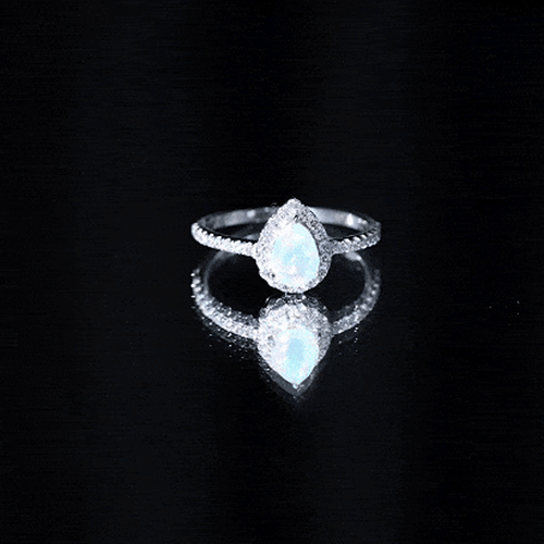0.7 Carat Natural Ethiopian Opal Teardrop Engagement Ring with Diamond Halo