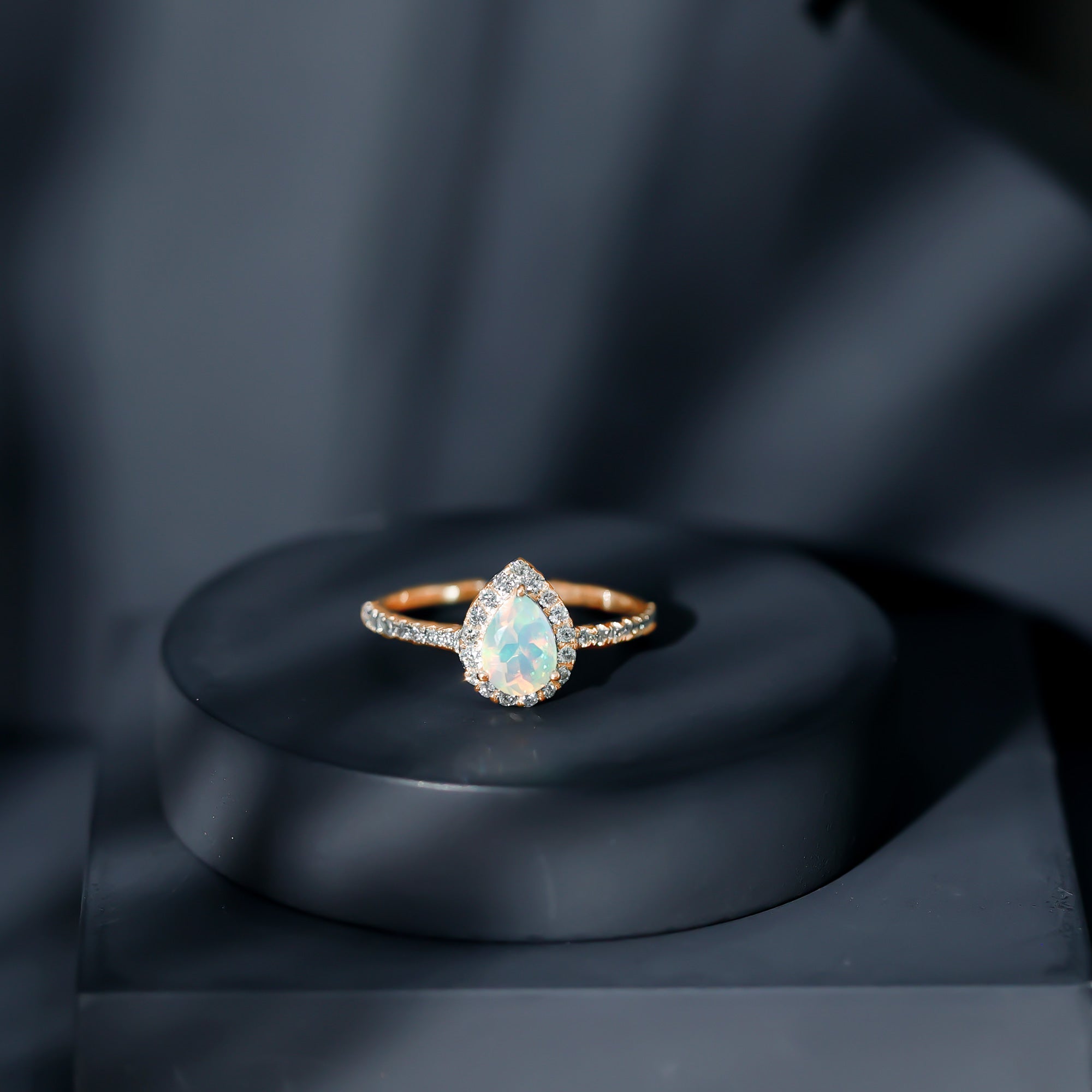 0.7 Carat Natural Ethiopian Opal Teardrop Engagement Ring with Diamond Halo