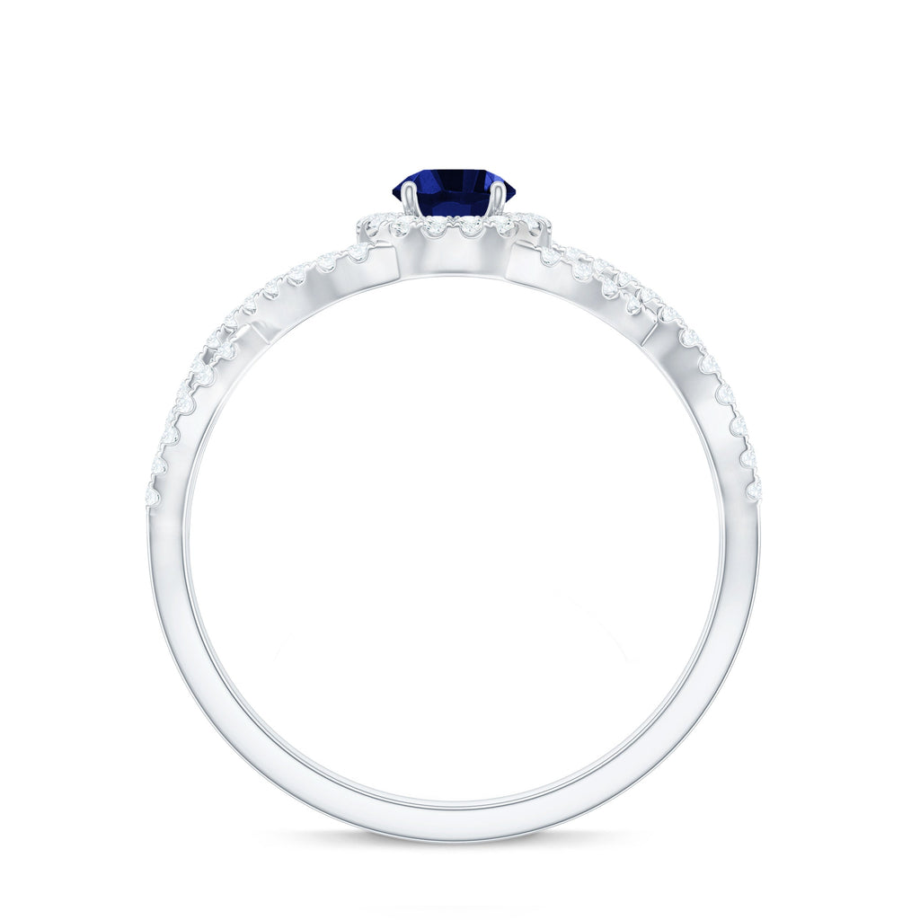 Certified 0.6 Carat Lab Grown Blue Sapphire Crossover Engagement Ring with Diamond