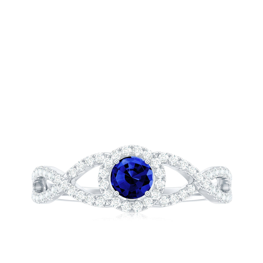Certified 0.6 Carat Lab Grown Blue Sapphire Crossover Engagement Ring with Diamond