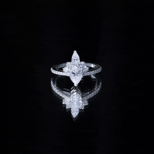 0.7 Carat Pear Shape Moissanite Crown Engagement Ring