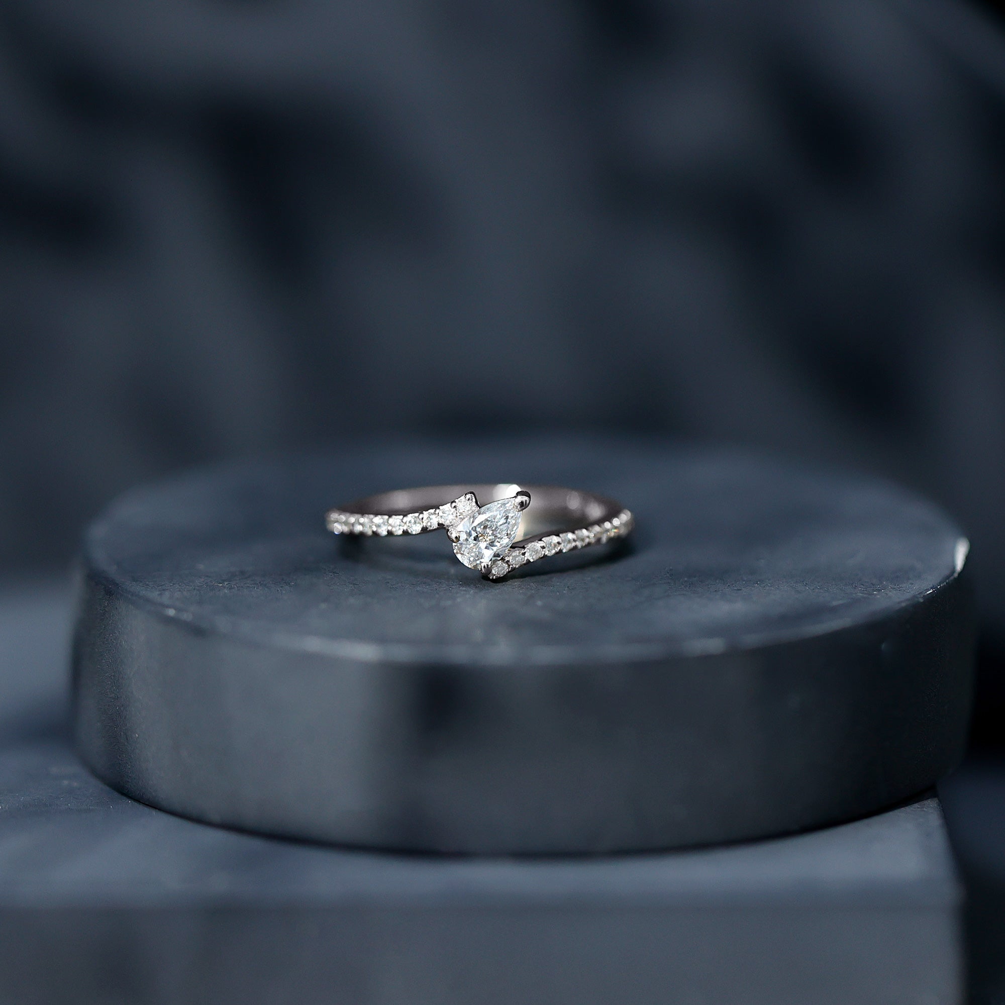Tilted Pear Shape Simulated Diamond Bypass Promise Ring