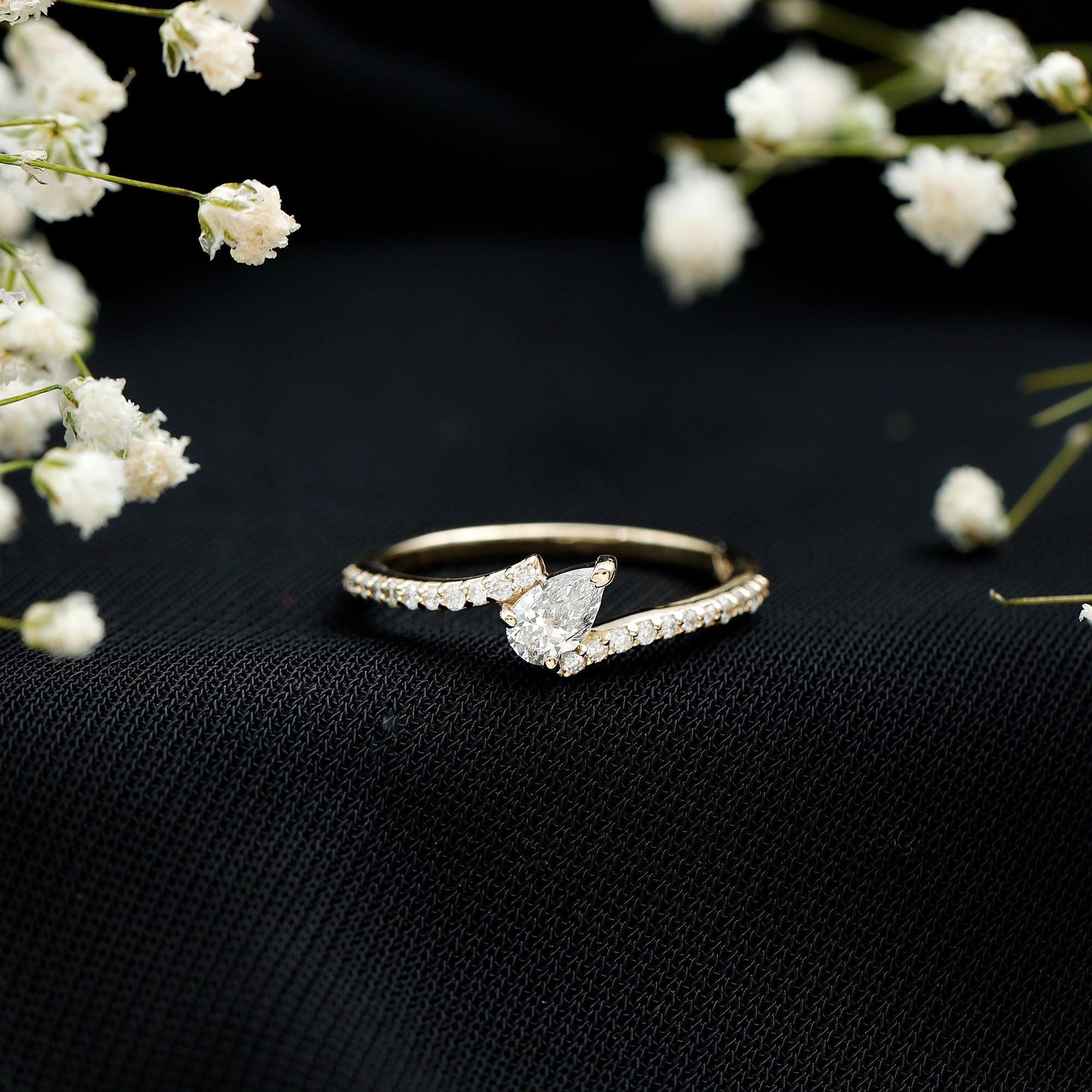 Tilted Pear Shape Simulated Diamond Bypass Promise Ring
