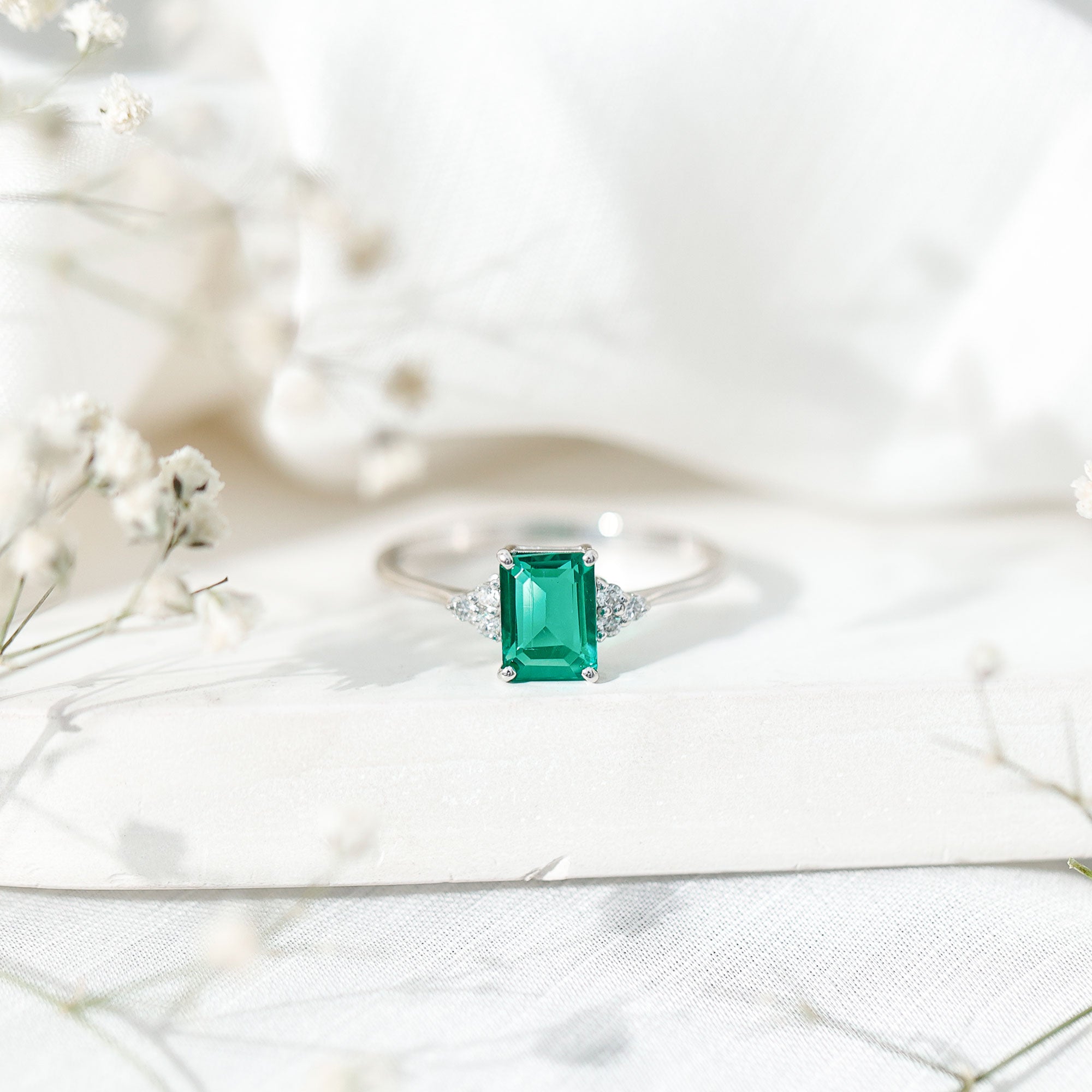 Certified 6X8 mm Lab Grown Emerald Cut Emerald Engagement Ring with Diamond Trio