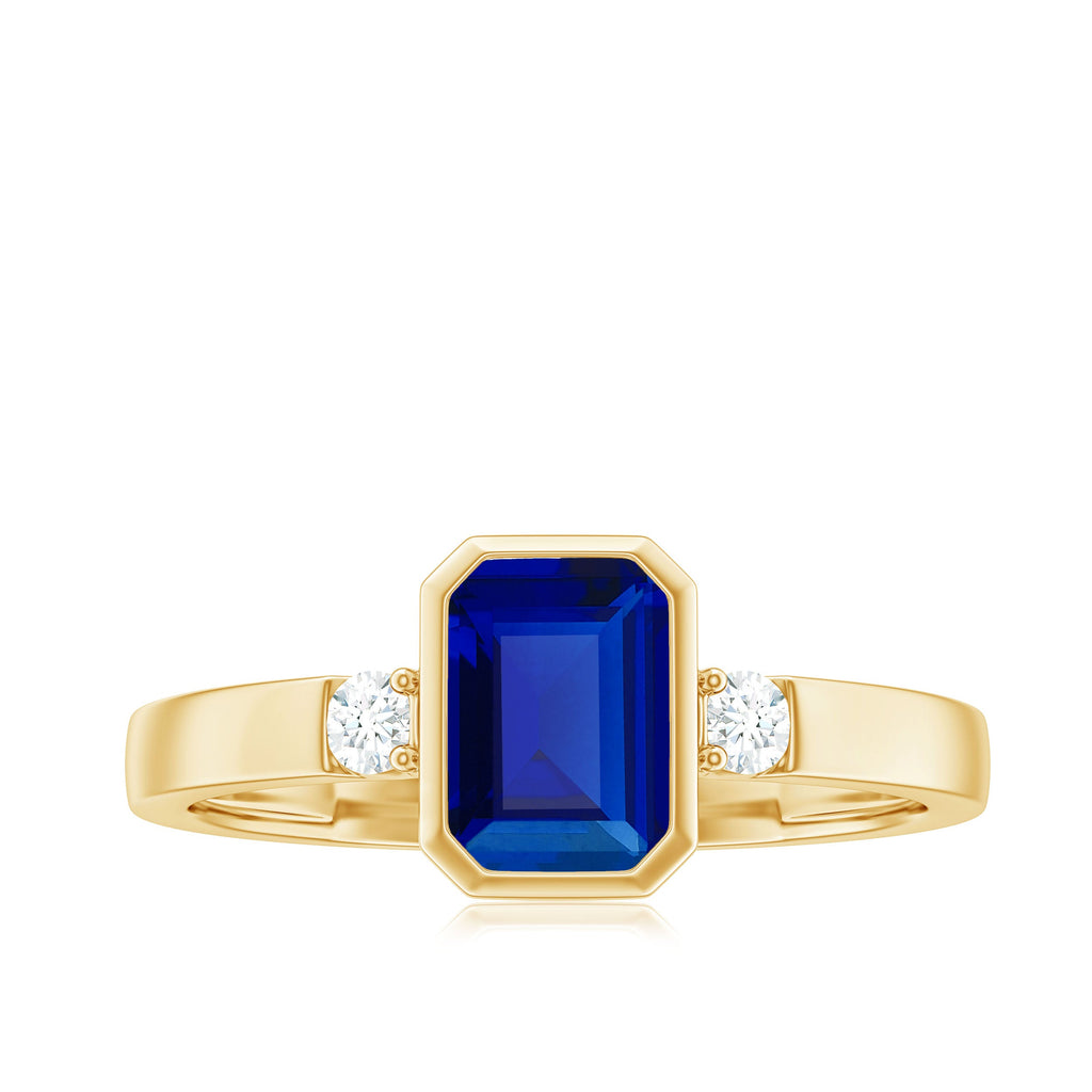 Bezel Set 1.75 Carat Lab Grown Blue Sapphire Emerald Cut Engagement Ring with Diamond