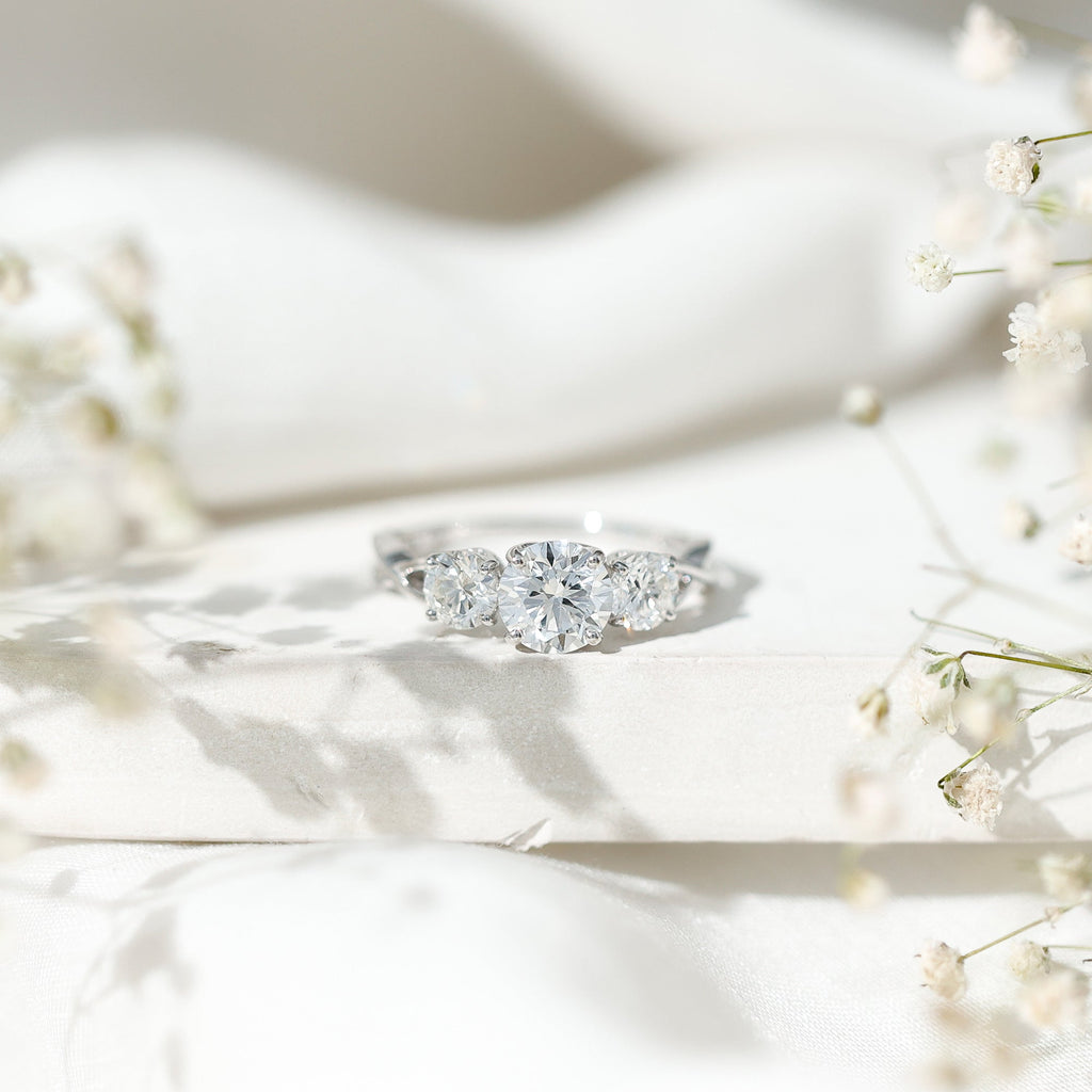 3 Stone Round Cubic Zirconia Crossover Engagement Ring