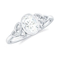 Oval Moissanite Solitaire Celtic Knot Ring in Bezel Setting