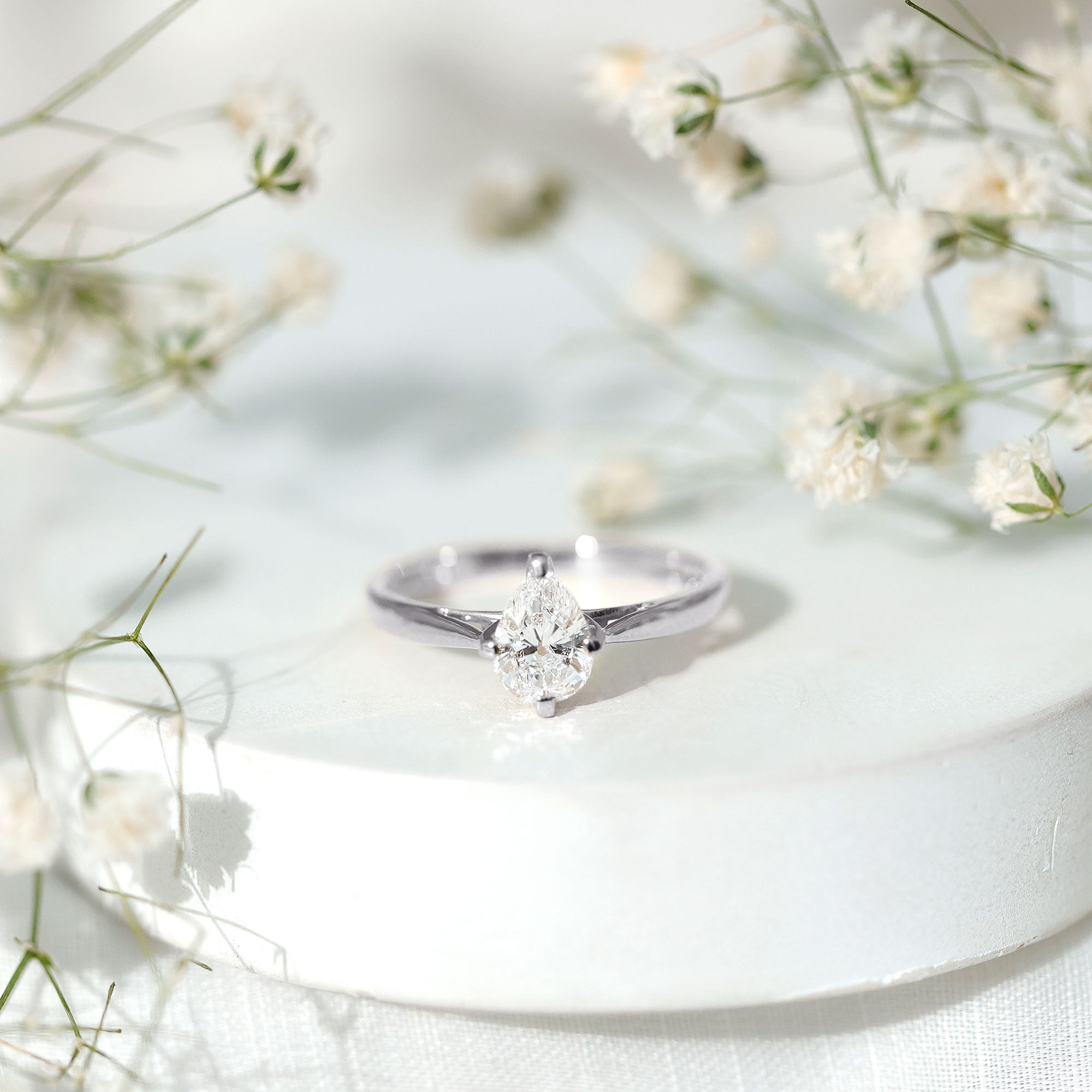 Certified Pear Shaped 0.7 Carat Moissanite Solitaire Engagement Ring