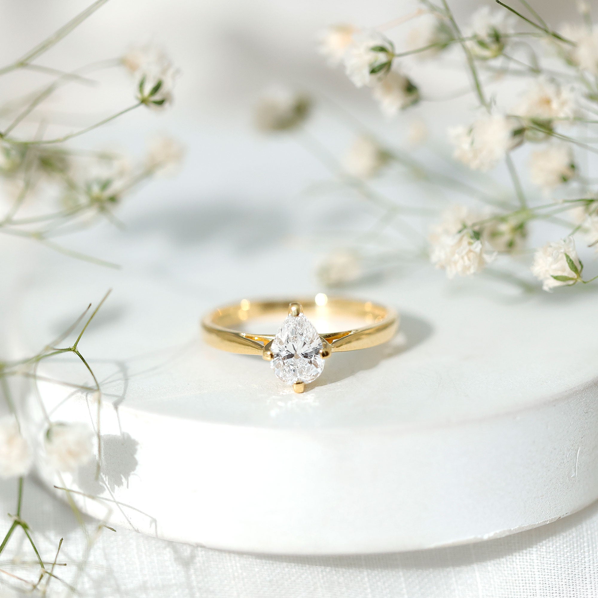 Certified Pear Shaped 0.7 Carat Moissanite Solitaire Engagement Ring