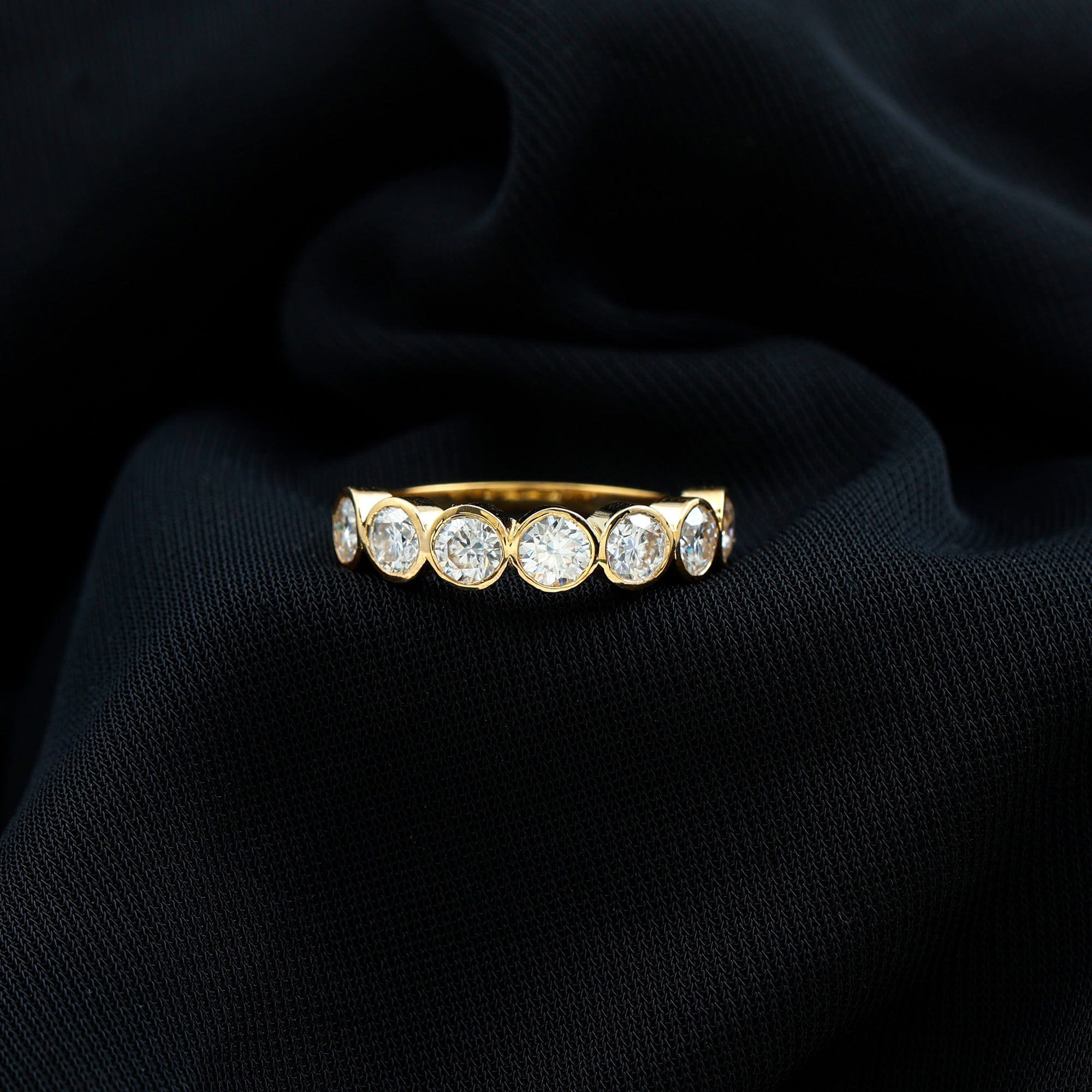 2.2 Carat Round Moissanite Half Eternity Ring in Bezel Setting