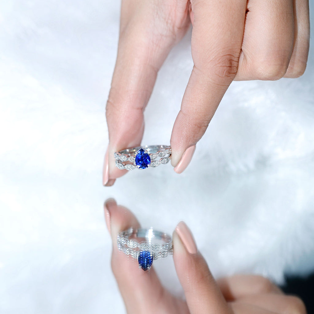 1.6 Carat Pear Lab Grown Blue Sapphire Engagement Ring with Diamond Band