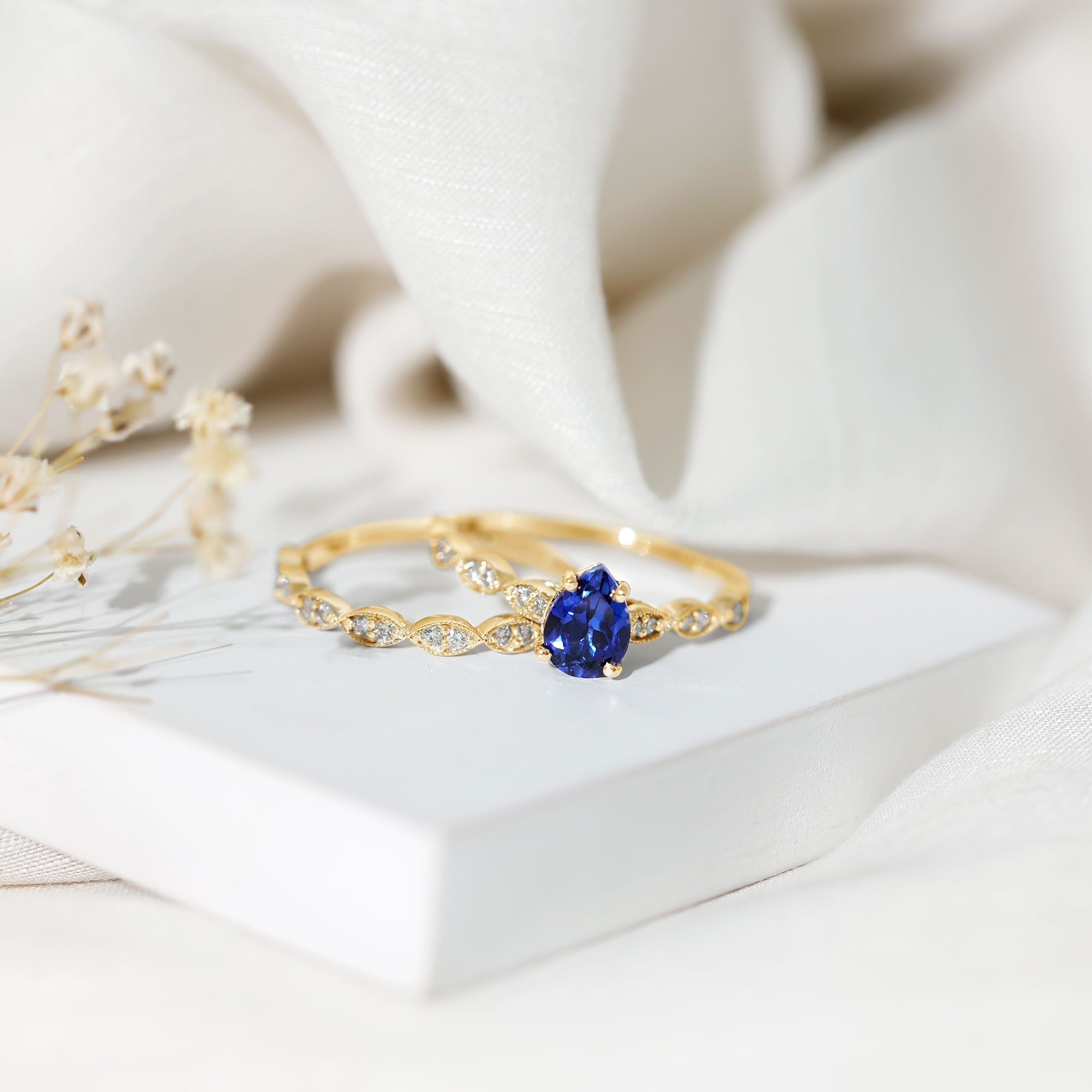 1.6 Carat Pear Lab Grown Blue Sapphire Engagement Ring with Diamond Band