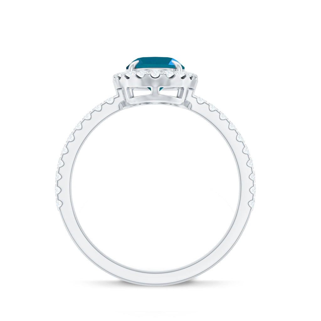Oval 6X8MM London Blue Topaz Halo Engagement Ring