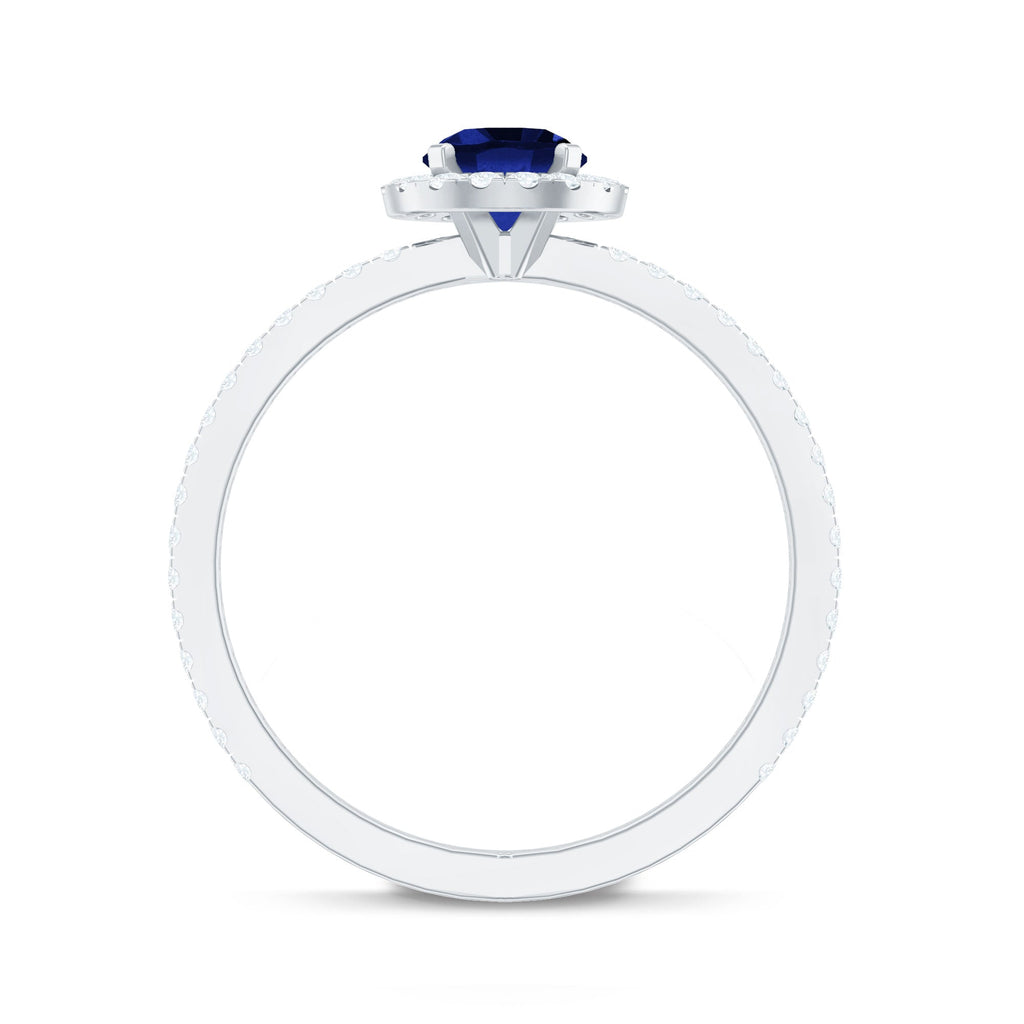 Certified 0.6 Carat Lab Grown Blue Sapphire Engagement Ring with Diamond Halo