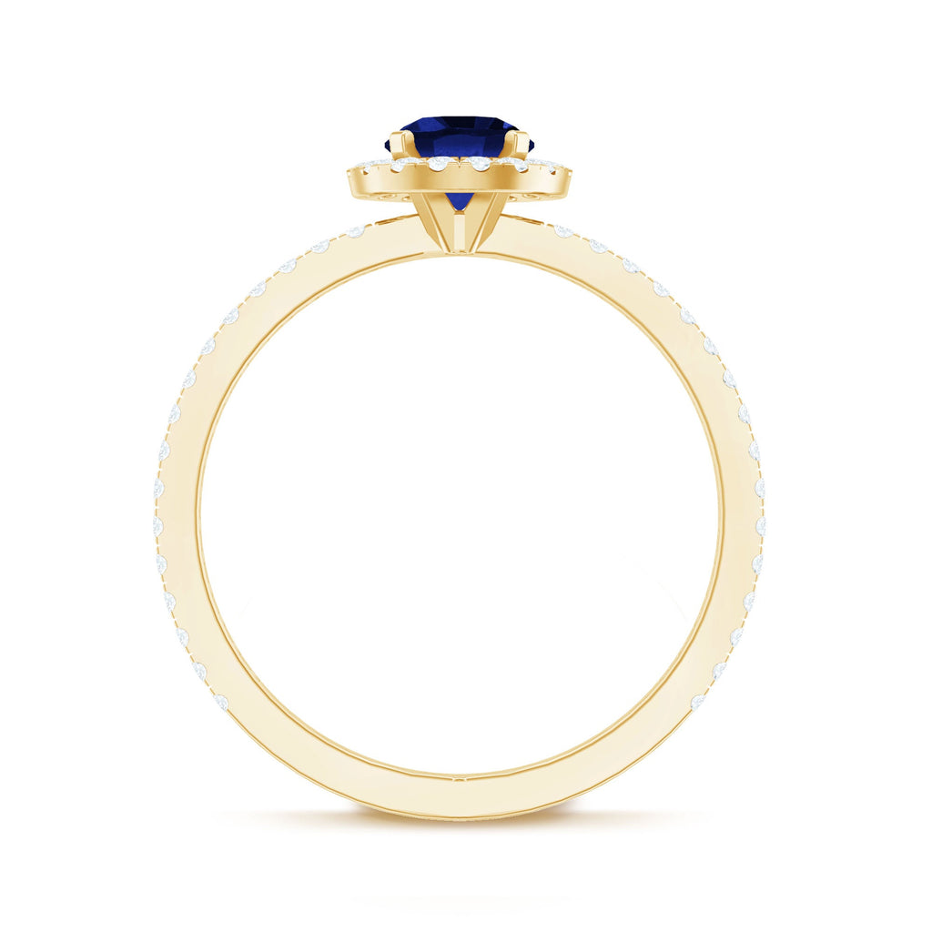 Certified 0.6 Carat Lab Grown Blue Sapphire Engagement Ring with Diamond Halo