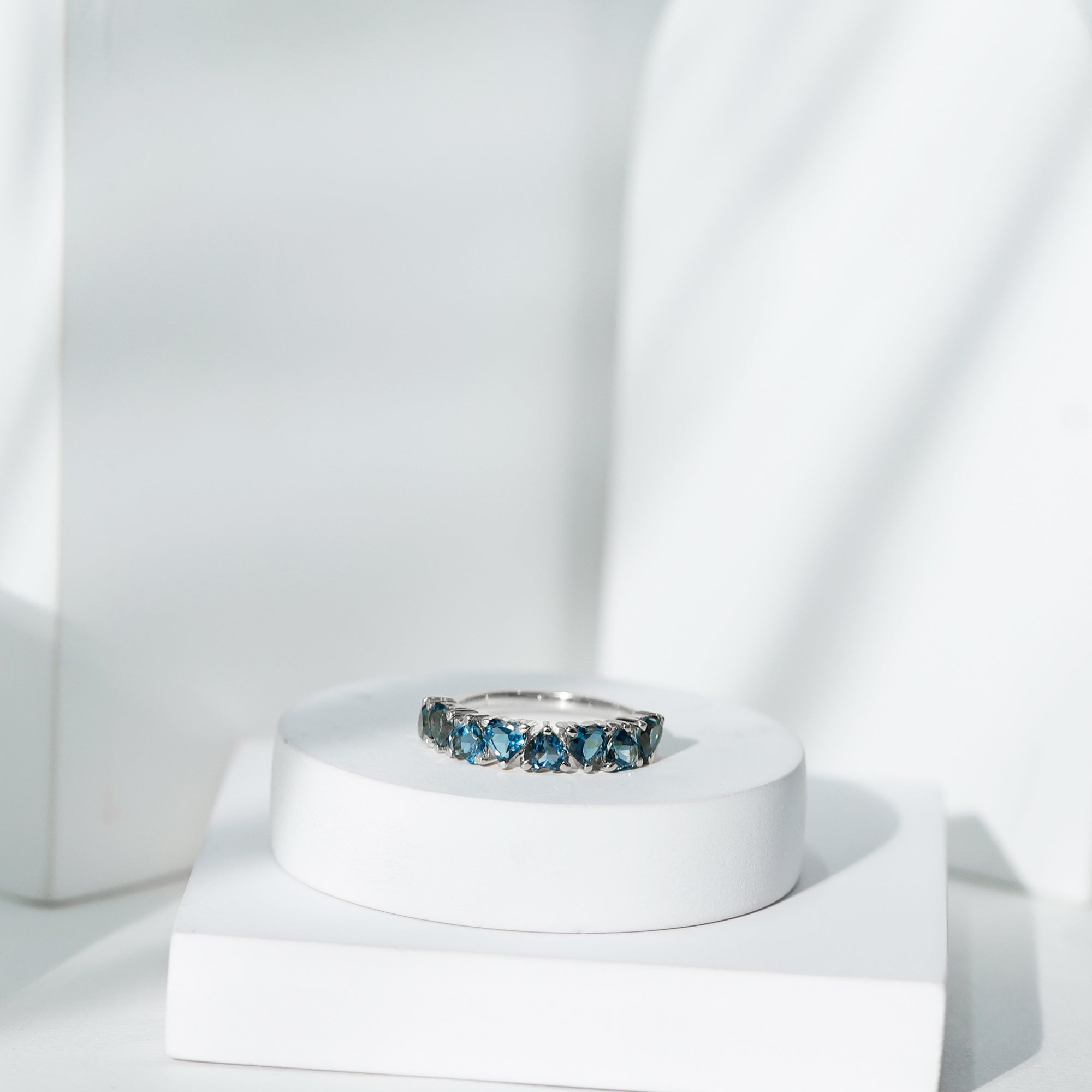 Brilliant Cut Heart London Blue Topaz Half Eternity Band