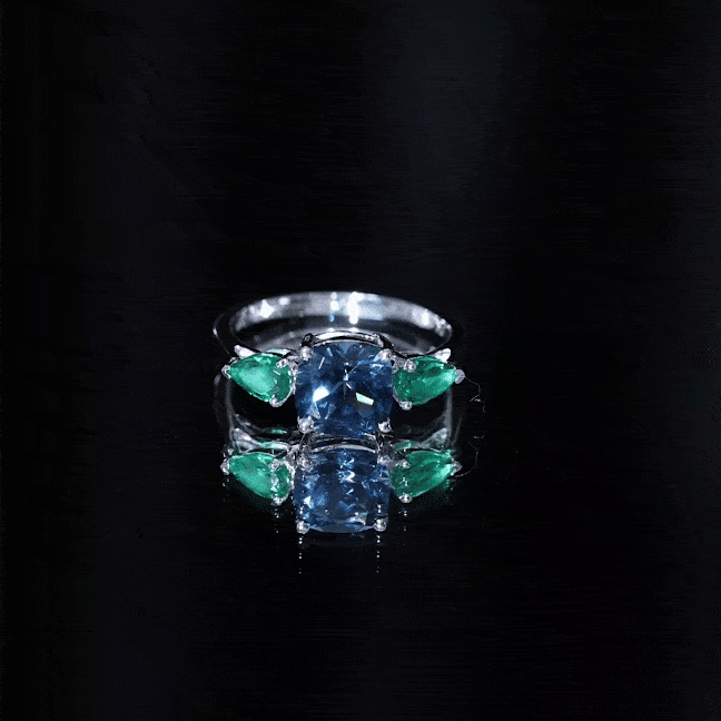 2.8 Carat Cushion Shape London Blue Topaz Three Stone Engagement Ring with Lab Emerald