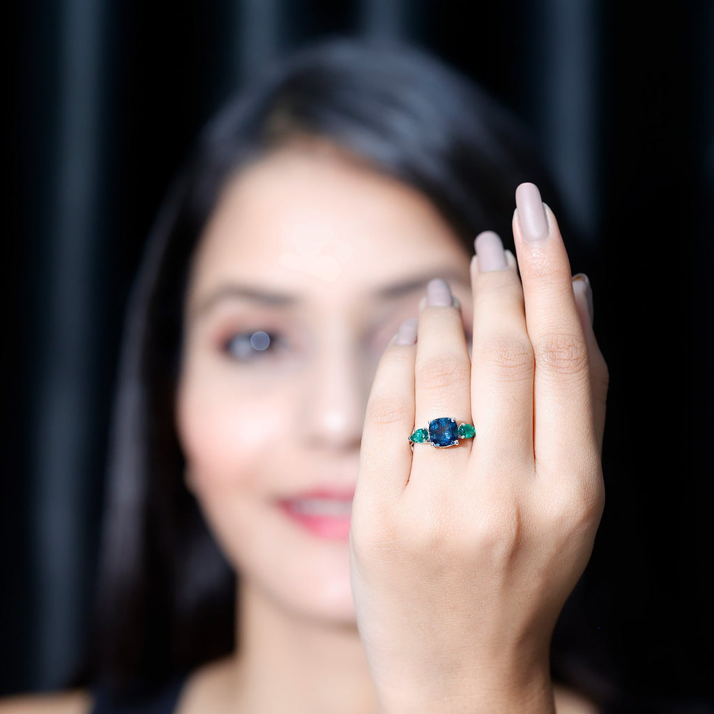2.8 Carat Cushion Shape London Blue Topaz Three Stone Engagement Ring with Lab Emerald